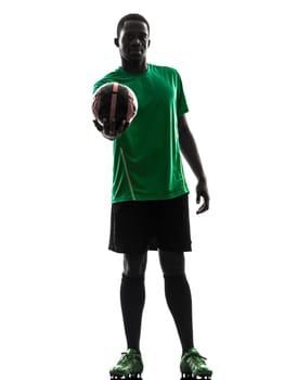 one african man soccer player green jersey holding showing football  in silhouette  on white background