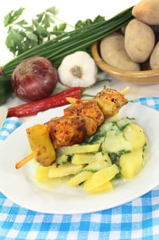 Potato-cucumber salad with a fiery skewer