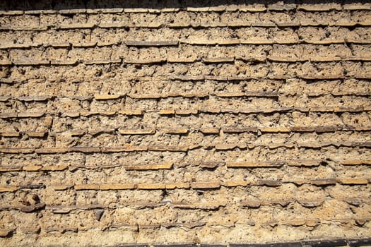 Wall made up of mud-brick and soil instead of cement or mortar