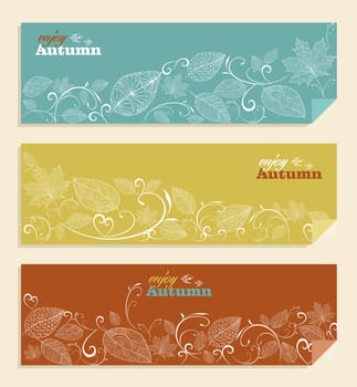Vintage hand drawn branches and leaves with enjoy autumn text web banners set. EPS10 vector file organized in layers for easy editing.