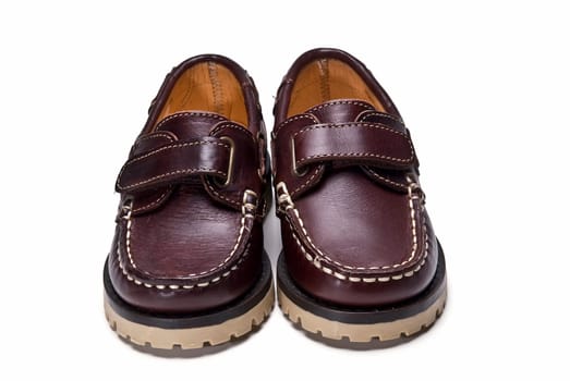 Shoes for kids isolated over a white background.