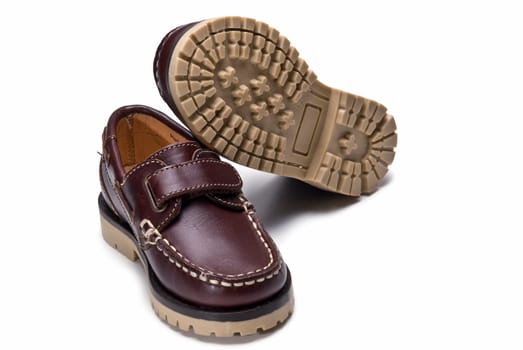 Shoes for kids isolated over a white background.