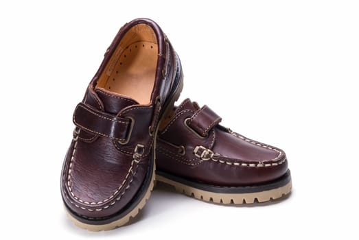 Shoes for kids isolated over a white background.