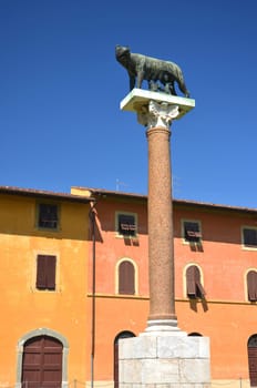 The statue of she-wolf on Square of Miracles in Pisa, Italy