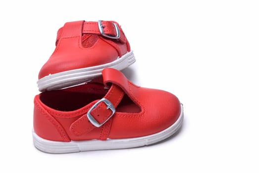 Shoes for kids isolated over a white background.