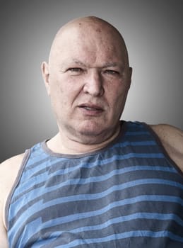 studio portrait elderly man with bald head