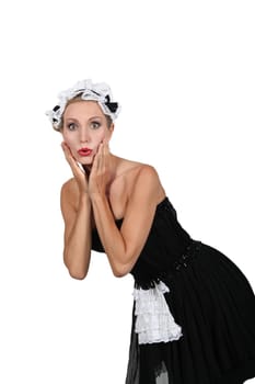 Woman in a saucy  French maid's outfit