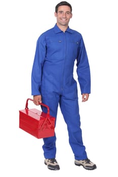 Man wearing blue overalls holding tool kit