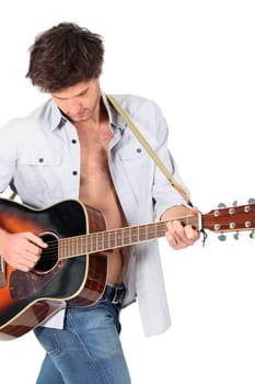 Young man playing a guitar