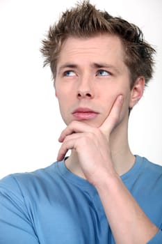 Teenage boy thinking hard