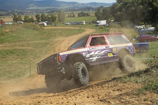 RAPOTIN, CZECH REPUBLIC - SEPT 07. Off-road cars on a trial race in the "BIG SHOCK CUP Trial 2013"" on September 07, 2013 near the village Rapotin, Czech Republic."