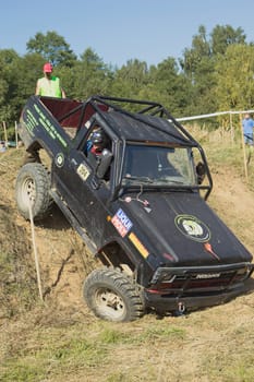 RAPOTIN, CZECH REPUBLIC - SEPT 07. Off-road cars on a trial race in the "BIG SHOCK CUP Trial 2013"" on September 07, 2013 near the village Rapotin, Czech Republic."