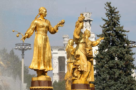Girl with a fountain of friendship of the peoples of Uzbekistan