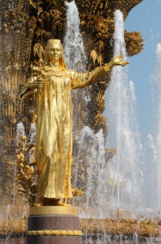 Girl with a fountain of friendship of the peoples of Tajikistan