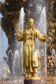 Girl with a fountain of friendship of peoples Turkmenistan