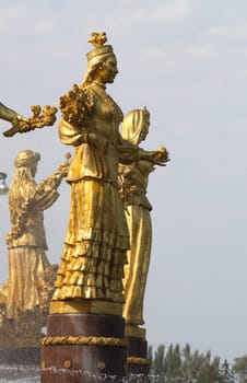 Girl with a fountain of friendship of peoples Kazakhstan