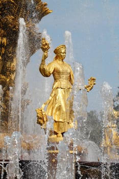 Girl with a fountain of friendship of peoples Lithuania