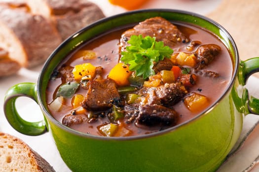 Tasty winter traditional hot pot stew with meat and vegetables stewed in a rich gravy for a wholesome meal on a cold day