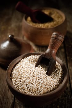 Bowl of dried quinoa seeds, a high-protein gluten-free vegetable originating in South America and a staple ingredient of rural nutrition