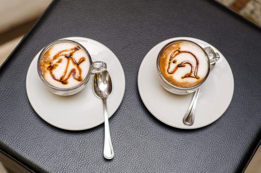 coffee decorated with fish caramel