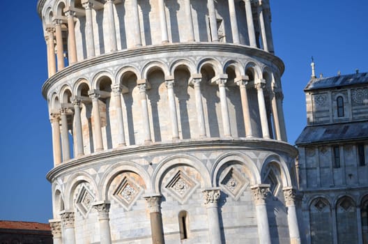 The famous Leaning Tower on Square of Miracles in Pisa, Tuscany - Italy