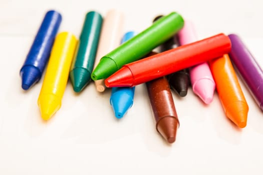 Painting with crayons .