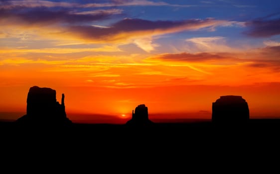 Sunrise at Monument Valley West and East Mittens Butte Utah National Park