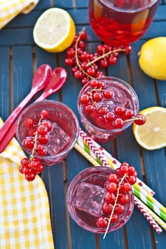 Fresh lemonade with fresh red currants and ice cream