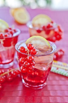 Fresh lemonade with fresh red currants and ice cream