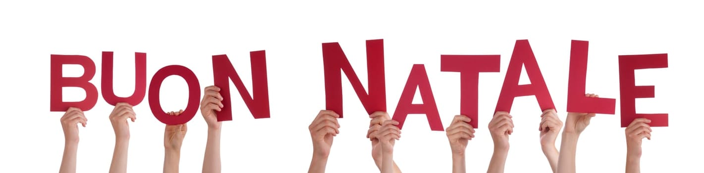 Hands Holding the Italian Word Buon Natale Which Means Merry Christmas, Isolated