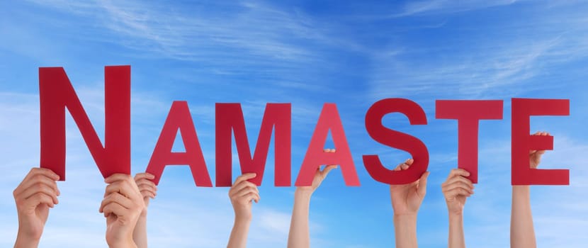 hands holding namaste