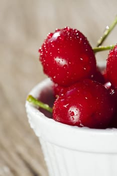 Red cherries with water drops in cross-section