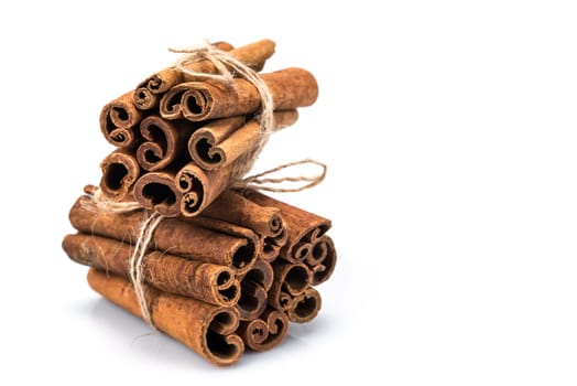 Cinnamon sticks isolated over a white background