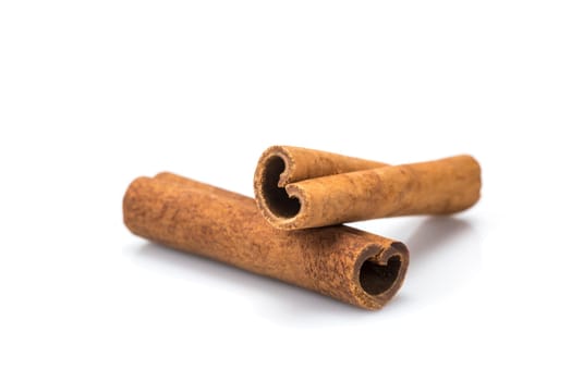 Cinnamon sticks isolated over a white background