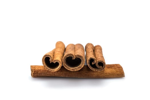 Cinnamon sticks isolated over a white background