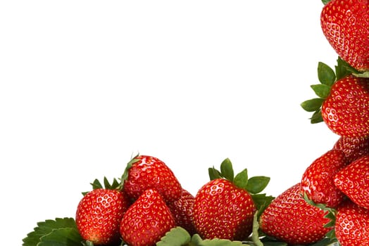Strawberries with their leaves isolated on a white background
