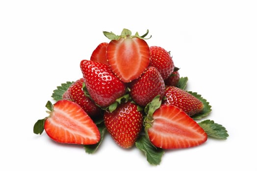 Strawberries with their leaves isolated on a white background