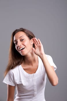 Girl showing how carefully she listens to you