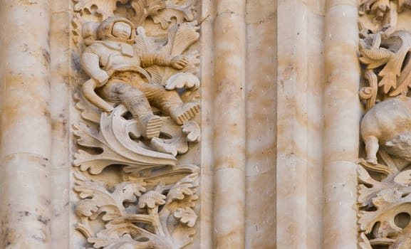 Detail of an astronaut made in stone. Cathedral, Salamanca. Spain