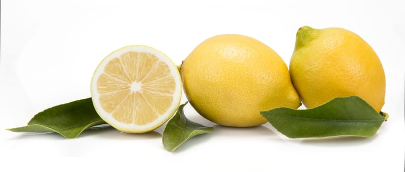 Fresh lemons isolated on a white background