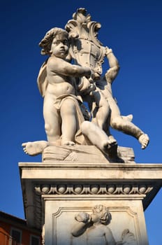 The statue of angels on Square of Miracles in Pisa, Italy