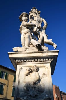 The statue of angels on Square of Miracles in Pisa, Italy