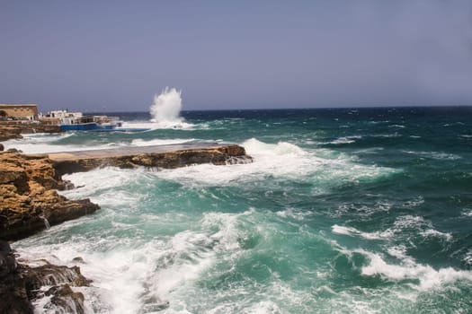 Huge waves getting into the swimming pool.