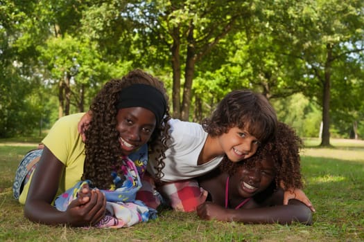 Happy african children having a nice dat at the park.