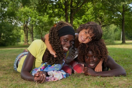 Happy african children having a nice dat at the park.