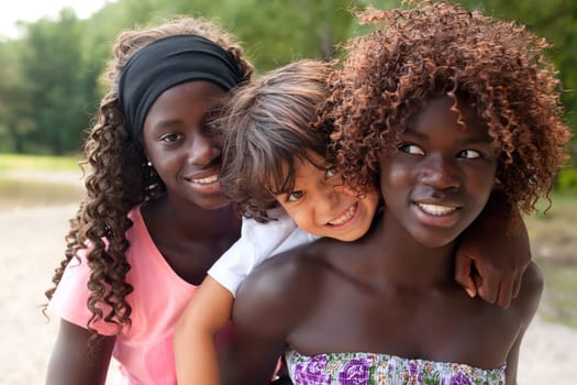 Happy african children having a nice dat at the park.