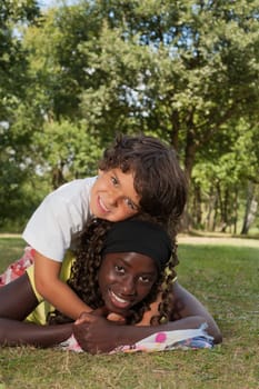 Happy african children having a nice dat at the park.