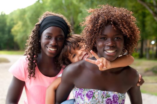Happy african children having a nice dat at the park.