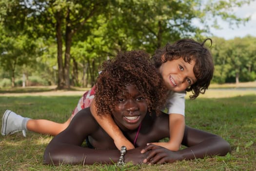 Happy african children having a nice dat at the park.
