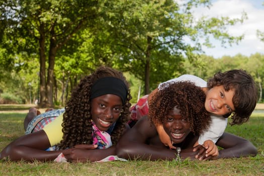 Happy african children having a nice dat at the park.